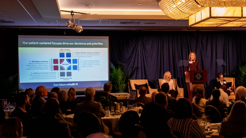 Sarah Nunnelly presents during East Alabama Health's 2026 State of the System address.