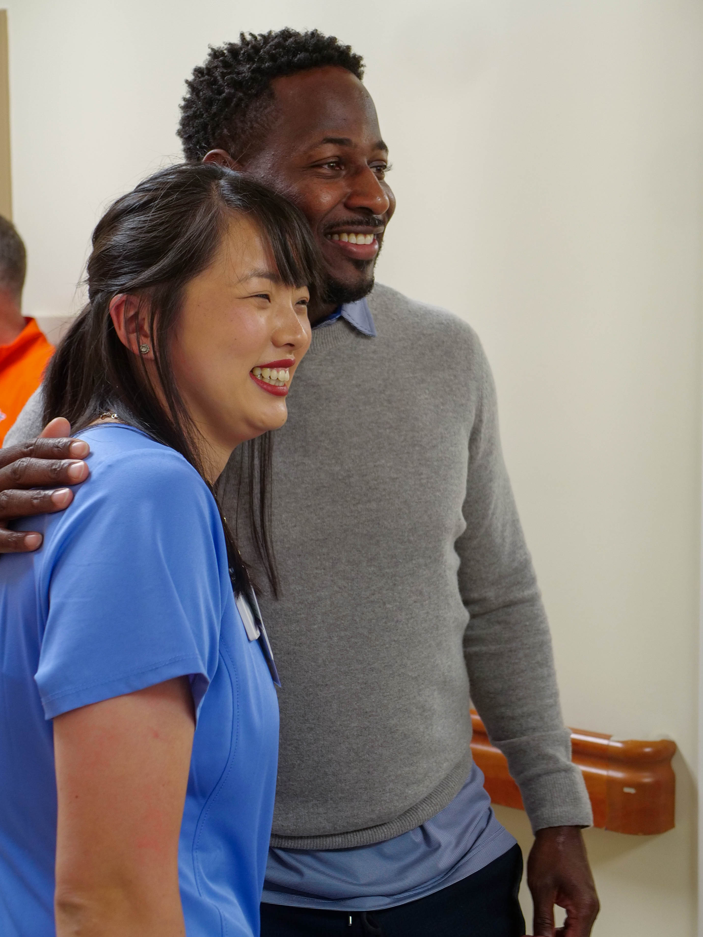 Carnell Williams takes a photo with a nurse at EAMC.